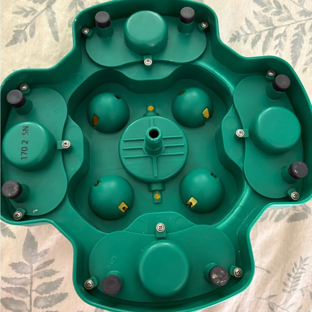 Interactive Green and Yellow Puzzle Feeder/Toy for dogs.